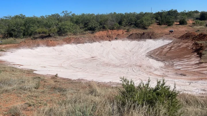 Line a pond with bentonite